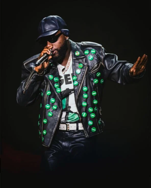 Davido Wears Custom Jacket Bearing Names Of Abducted Pupils, Teachers At FIFA Concert