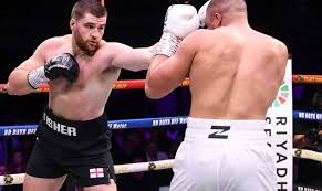 Fisher Beats Pirotton by Majority Decision After 10-Round Heavyweight Battle